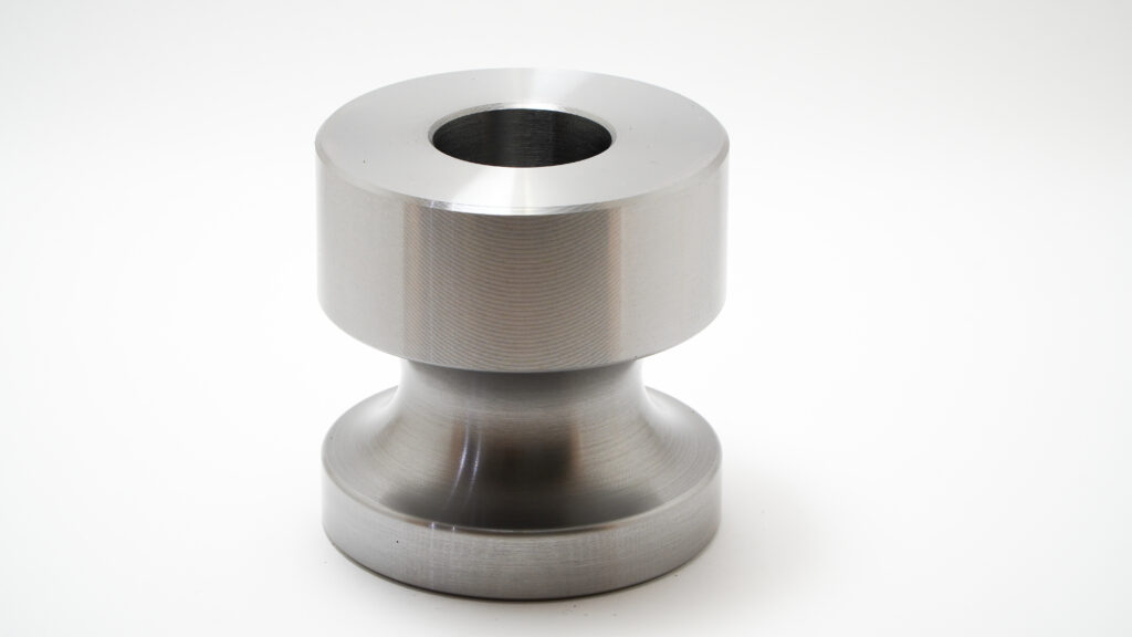 Rodillos y piezas de metal fabricadas con CNC